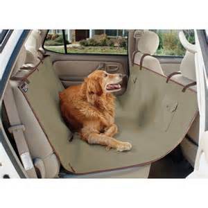 Dog Resting On Car Seat Cover